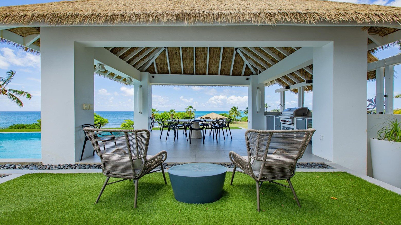 Beachfront cabana with grill and dining
