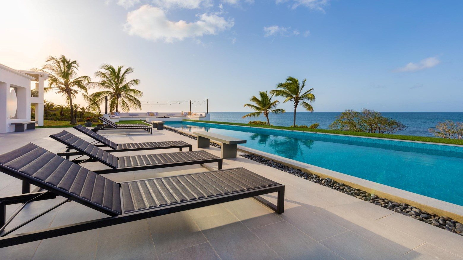 Infinity pool and ocean at golden hour